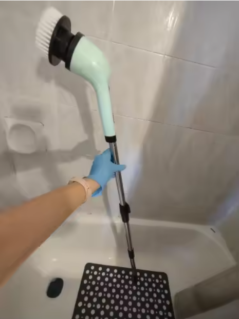 Customer using PowerSpin in a shower